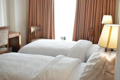 Esquire Hotels & Apartments - image 1