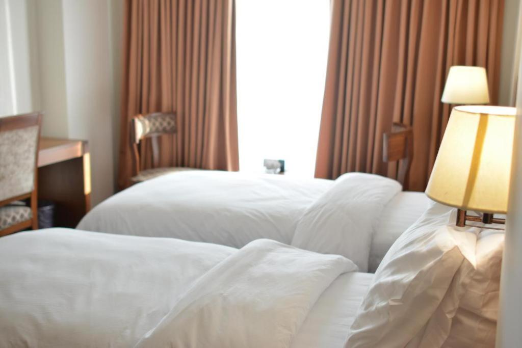 Esquire Hotels & Apartments - main image