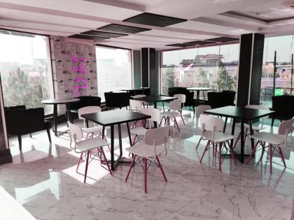 Esquire Hotels & Apartments - image 17