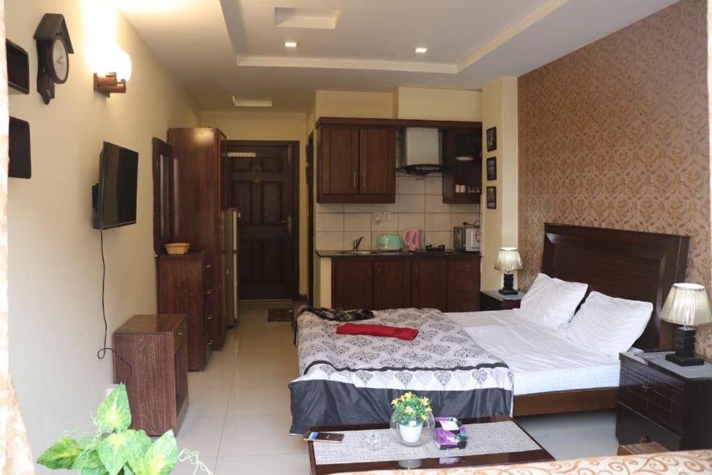 Cozy Studio Apartment In Bahria town - main image