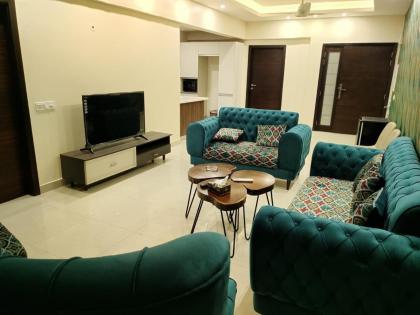 Elysium Service Apartment - image 23