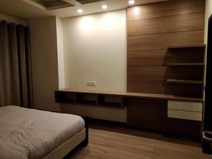 Elysium Service Apartment - image 26