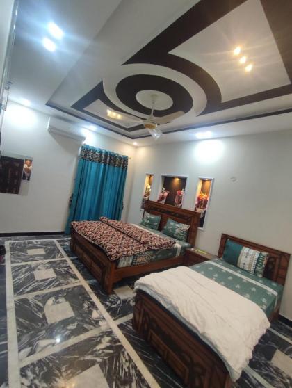 Fasil-Town Rooms Near Isb Air port - image 12