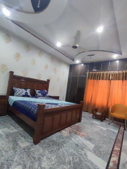 Fasil-Town Rooms Near Isb Air port - image 13