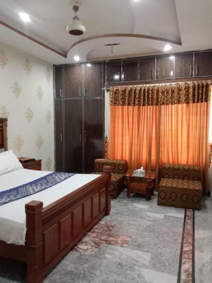 Fasil-Town Rooms Near Isb Air port - image 16