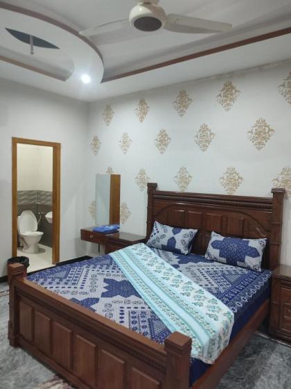 Fasil-Town Rooms Near Isb Air port - image 17