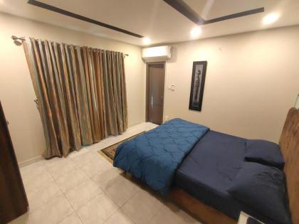 Luxurious & Cozy 1BHK Apartment Wi-FiSmart TV - image 5