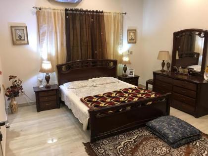 MJS Entire New Designer House 5 BR 13 bed 2 living reclining sofas Italian kitchen 6 bath garage side garden at prime location of Bahria Town Islamabad - image 26