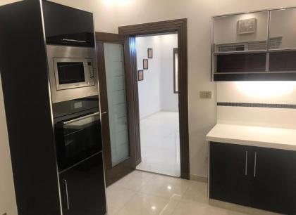 MJS Entire New Designer House 5 BR 13 bed 2 living reclining sofas Italian kitchen 6 bath garage side garden at prime location of Bahria Town Islamabad - image 29