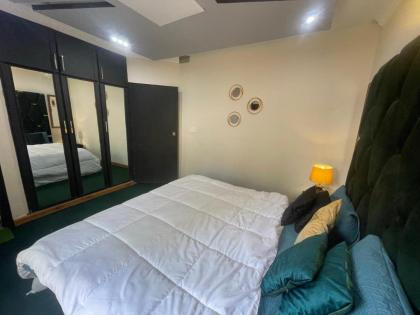 Urban Oasis in F10: Elegant 1BHK Apartment - image 23