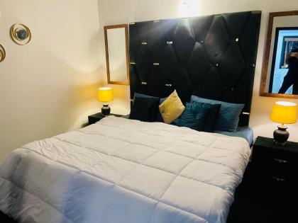 Urban Oasis in F10: Elegant 1BHK Apartment - image 24