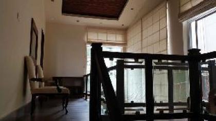 Whispering Pines Hotel & Residences - image 12